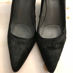 Black pony-hair wedge pumps
